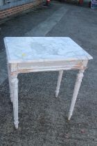 A French painted marble top occasional table, on fluted supports, 25 1/2" wide x 18" deep x 29 1/