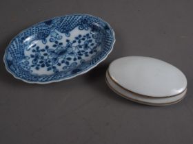 A Makkum delftware oval dish, 5" max dia (rim chip restored) and a Limoges oval box and cover