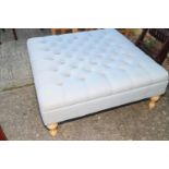 A modern square ottoman/stool, button upholstered in a grey linen, 36" square x 16" high