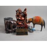A carved hardwood Hotei with children, 8" high, on stand, a cloisonne pig, two elephant models, etc