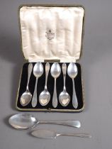 A cased set of six silver teaspoons, a silver preserve spoon and silver butter knife, 3.9oz troy