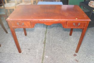 A mahogany and banded dressing table/desk, fitted two drawers, 47" wide x 23" deep x 31" high, and