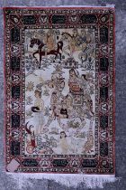 A Persian silk pile picture rug with mounted figures, camel, deer, tiger, mythical beasts and