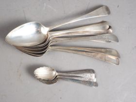 A set of six Georgian silver shell bowl teaspoons with bright cut decoration, and a number of