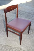 A set of six 1960s Danish rosewood dining chairs with leather stuffed over seats, on turned and