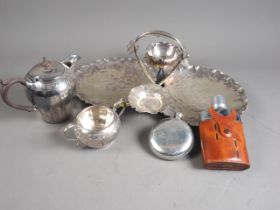 A silver plated leaf-shape strawberry and cream set, a plated solo teaset, two hip flasks and two