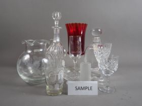 A pair of decanters and stoppers, one other decanter and other table glass, etc