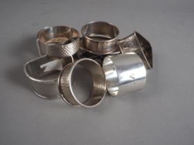 Eight silver napkin rings, various, 5.5oz troy approx