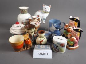 A Wedgwood jasper tankard, three boxes and covers, and other jasperware, four pieces of Devon/