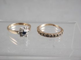A 9ct gold engagement ring, set sapphire and six illusion set diamonds, 2.1g gross, and a 9ct gold