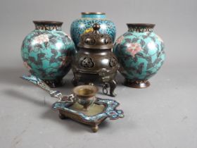 A Chinese bronze incense burner, 5 1/2" high, a pair of Oriental cloisonne enamel bulbous vases with