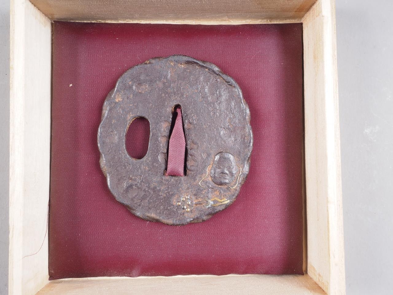 A Japanese Edo period iron Tsuba decorated Noh mask, 2 1/2" dia, and a similar larger with gold - Image 4 of 5