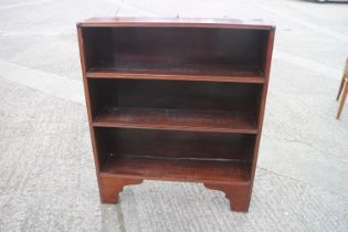 An early 20th century walnut open bookcase, on bracket feet, 34 1/2" wide x 8 1/2" deep x 40 3/4"