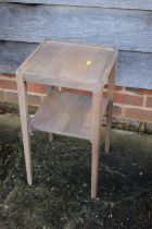 A modern grey painted tray top two-tier occasional table, on tapering supports, 12" square x 21 3/4"