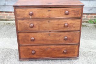 A 19th century mahogany chest of four long graduated drawers with knob handles, 37" wide x 18"