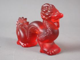 A Lalique France red frosted glass model of a dragon, 4" long