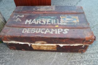 An early 20th century leather Marseille suitcase with wood battens, 31" wide