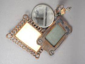 A painted metal desk calendar, figure by a lamp, 6" high, a copper openwork photo frame and an