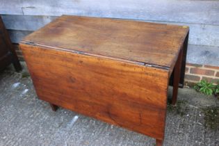 A Georgian mahogany drop leaf dining table, on square supports, 60" wide x 42" deep x 28 1/2" high