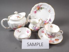 A Royal Crown Derby "Derby Posies" pattern part teaset, including solo teapot and cake plates