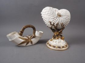 A late 19th century Royal Worcester nautilus shell vase, 8 1/2" high, and a similar bamboo style
