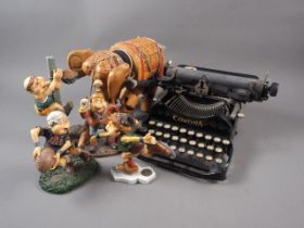 A carved hardwood and painted elephant puppet, a Carona portable typewriter and four Leaf limited