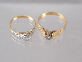 An 18ct gold and diamond solitaire ring, size L, 2g, and an 18ct gold and diamond illusion set ring,