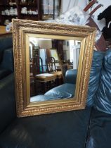 A gilt framed wall mirror, plate 18" x 20"