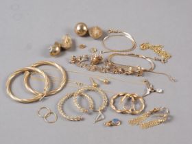 A selection of 9ct gold jewellery including hoops earrings, ear studs, necklaces, etc, 30.6g gross