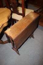 An Edwardian oak Sutherland table, on slender bobbin turned supports, 24" wide x 28" wide x 28" high