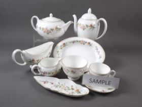 A Wedgwood "Mirabelle" pattern tea service for twelve, six coffee cups and saucers, teapot, coffee