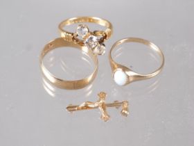 An 18ct gold crossover ring set central diamond flanked paste stones, size M/N, 3.8g, a 9ct gold