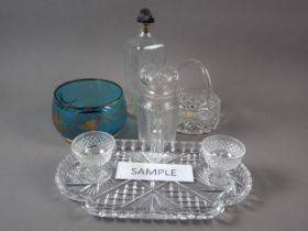 A moulded glass basket, seven moulded glass bowls and other glass