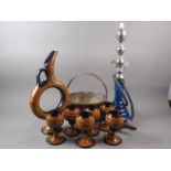 A Turkish ceramic moon-shaped ewer, six matching goblets, a blue glass hookah pipe and a brass jam