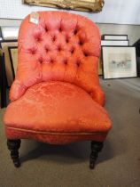 A late 19th century tub seat chair, button upholstered in a salmon pink brocade, on turned