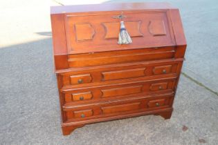 A walnut fall front bureau, fitted three field panel front drawers, 34" wide x 14 1/2" deep x 34"