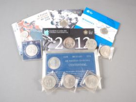Three Royal Mint commemorative £2 coins, a similar London Olympics £5 coin, and seven various