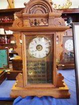 An American walnut mantel/shelf clock striking on bell and gong, 24" high