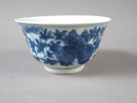 A Chinese porcelain blue and white tea bowl with six-character mark, 4" dia