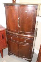 A mahogany bowfront cocktail cabinet, fitted slide and drawer, on bracket feet, 24" wide x 17"