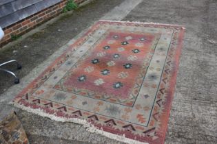 A modern Gabbeh rug of Kazak design, on a light ground, 92" x 63" approx