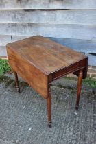 A late Georgian Pembroke table, fitted one drawer, on turned and tapering supports, 39" wide x 32"