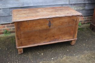 An early 18th century Hanseatic planked oak coffer, the interior fitted candle box, on stile