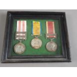 A set of three reproduced Victorian Indian campaign medals, including Lucknow bar