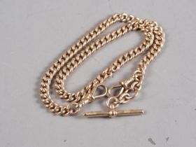 A 9ct rose gold curb link, Albert chain, 17" long, 52.7g