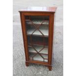 An Edwardian mahogany and satinwood banded display cabinet, fitted four shelves enclosed astragal