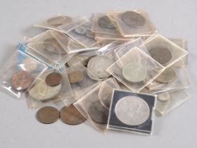 A collection of Georgian, Victorian and later British coinage, including thrupenny bits, pennies,