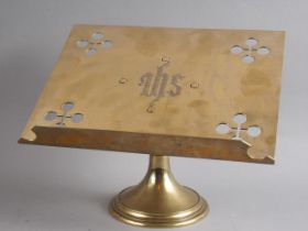 A pierced brass lectern/bible stand, on circular base, 12" wide