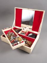 A jewellery box, containing a selection of costume jewellery and a silver charm bracelet