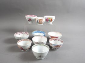 Ten 18th century and later English porcelain tea bowls with chinoiserie decoration (some with rim